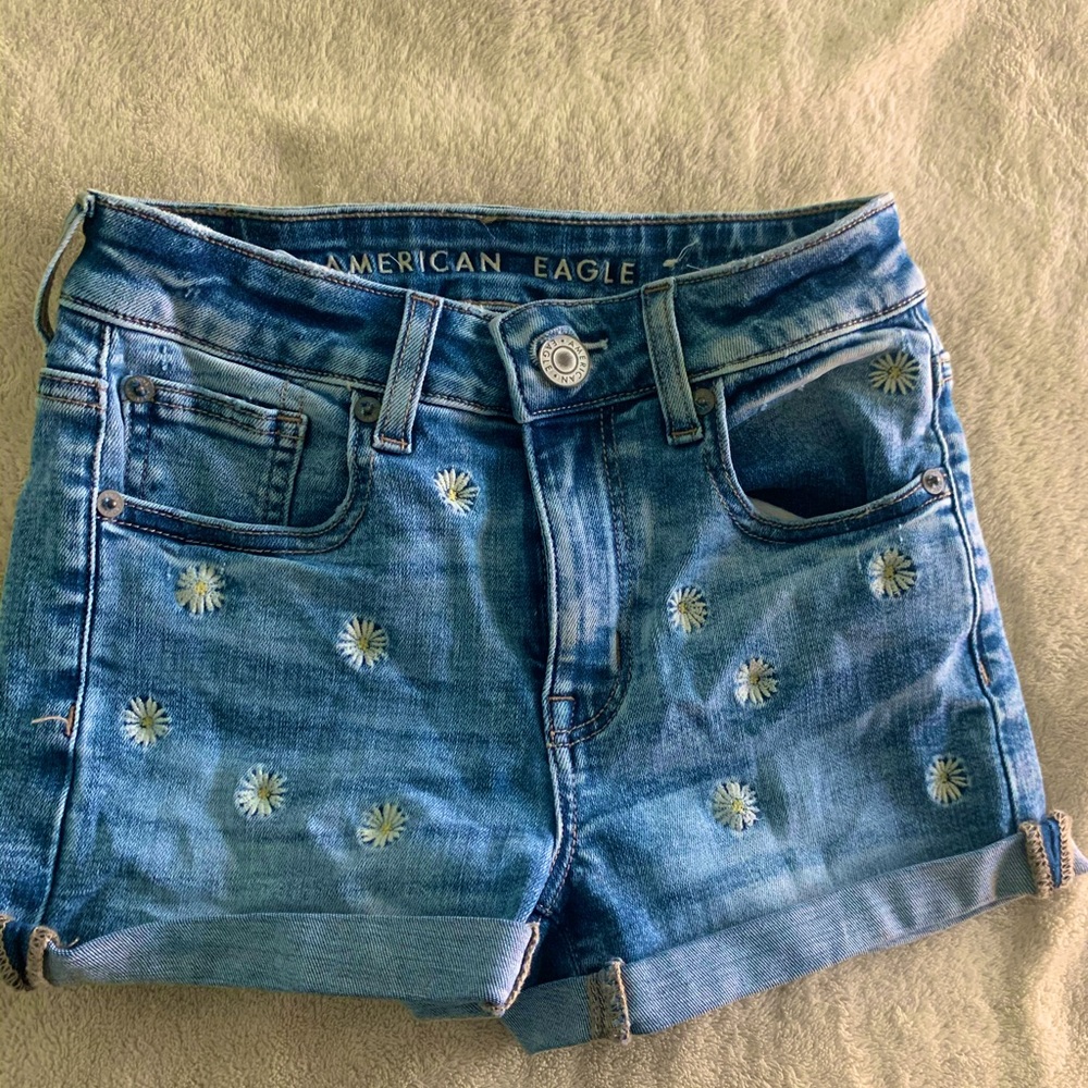American Eagle jean shorts with Daisy design